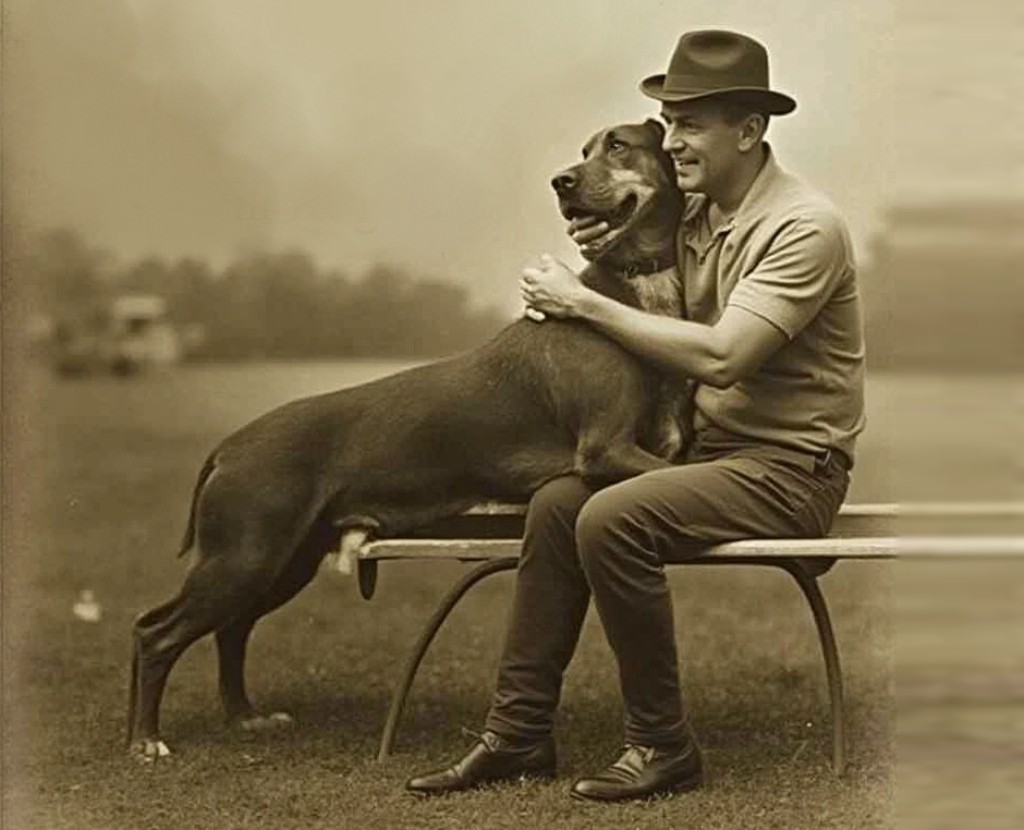 Vieille image d'un homme et d'un chien